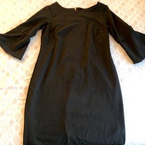 Shelby & Palmer women's n black  dress Size 12Fluted 3/4 sleeves. Round neck.